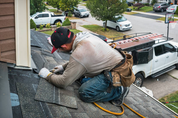Professional Roofing technician working in Gaines, MI